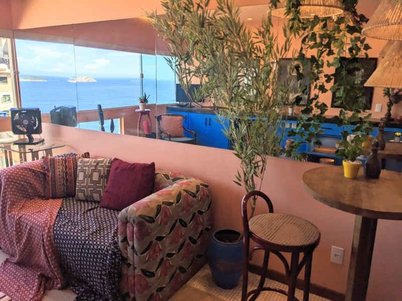 Sofa and high table by the window