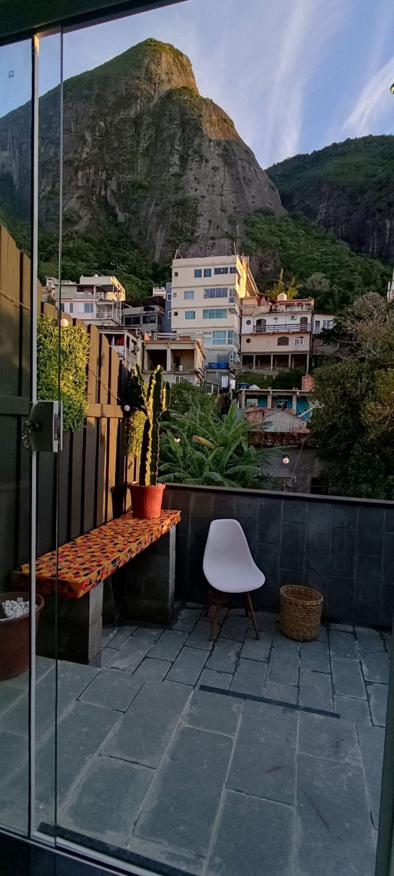 The terrace door, with the Dois Irmãos above the houses