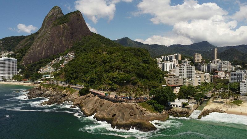 Dois Irmãos above Avenida Niemeyer and the rocks at the end of Leblon